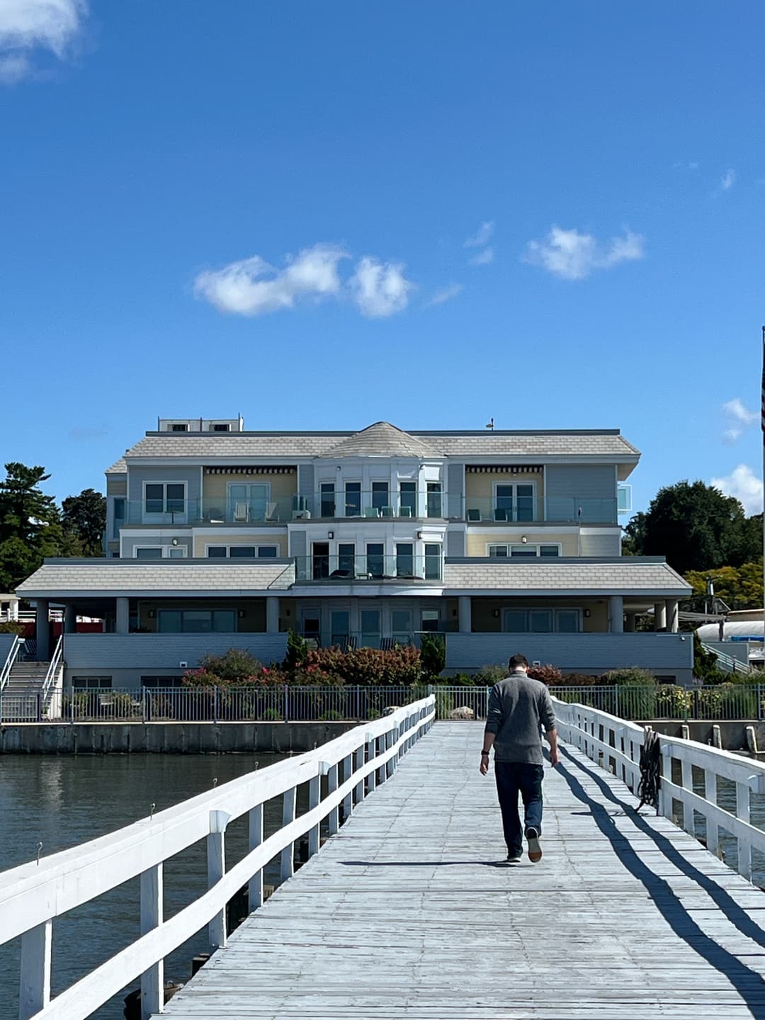 View of Fathoms Hotel marina front