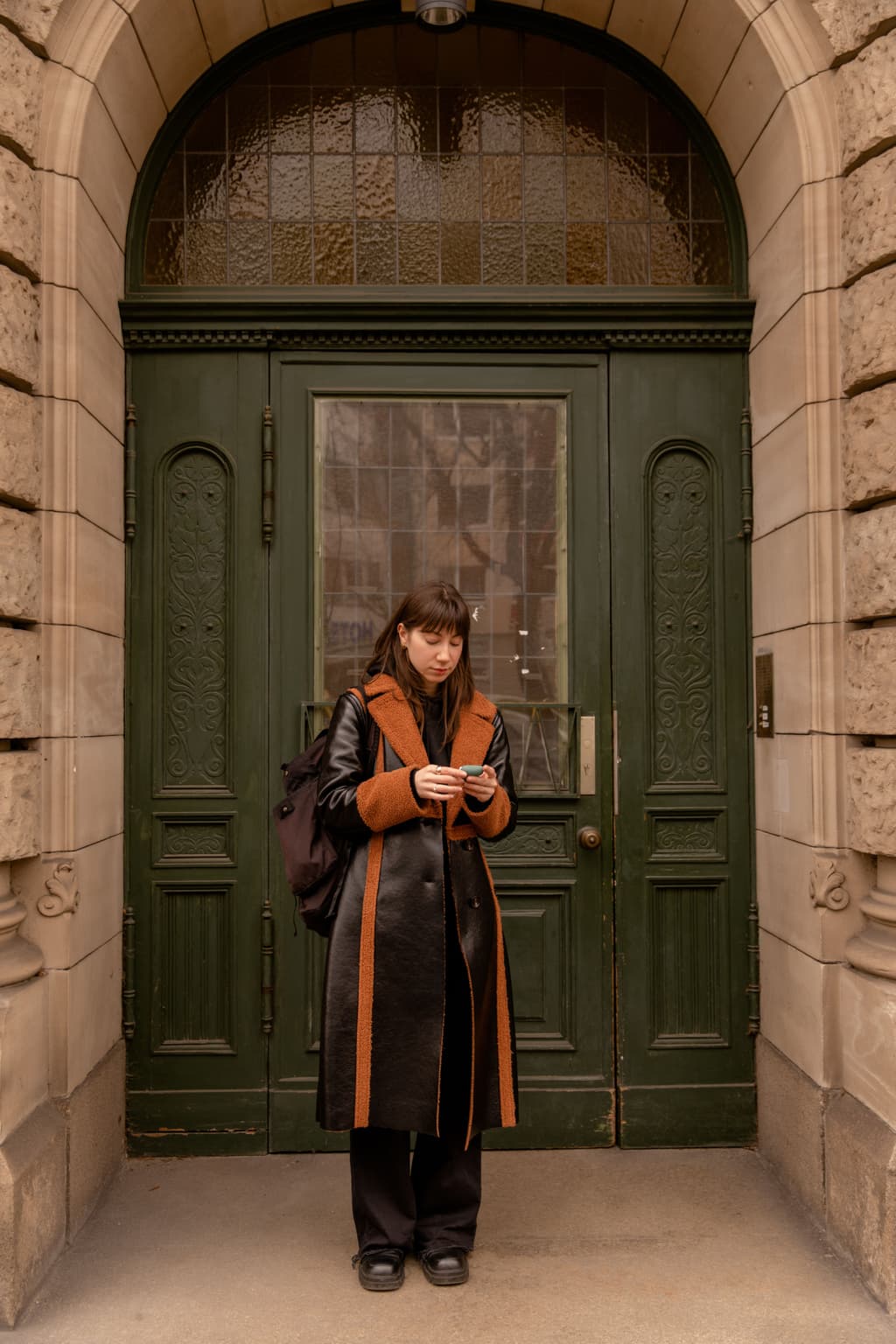 A female traveler leaves a property in a big city