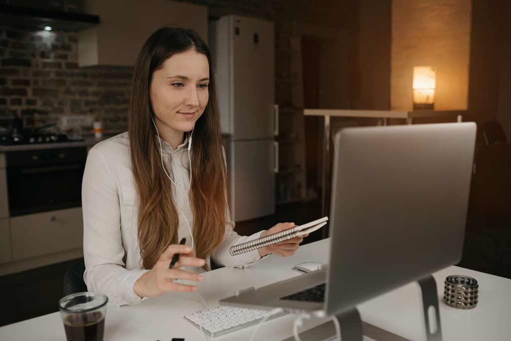 Female hospitality worker creates images for her property