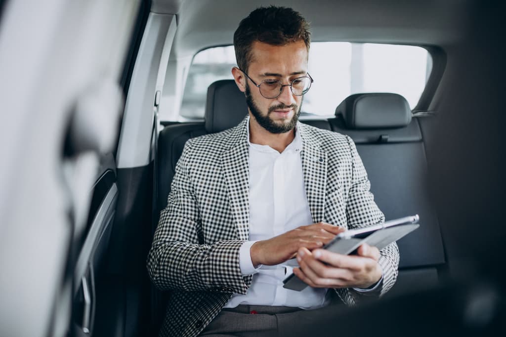 A rider on his way to his property stay booked on Uber