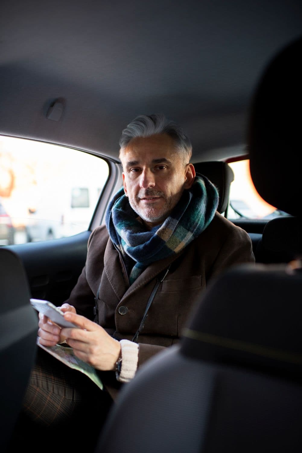 A senior rider on his way to his property stay booked on Uber