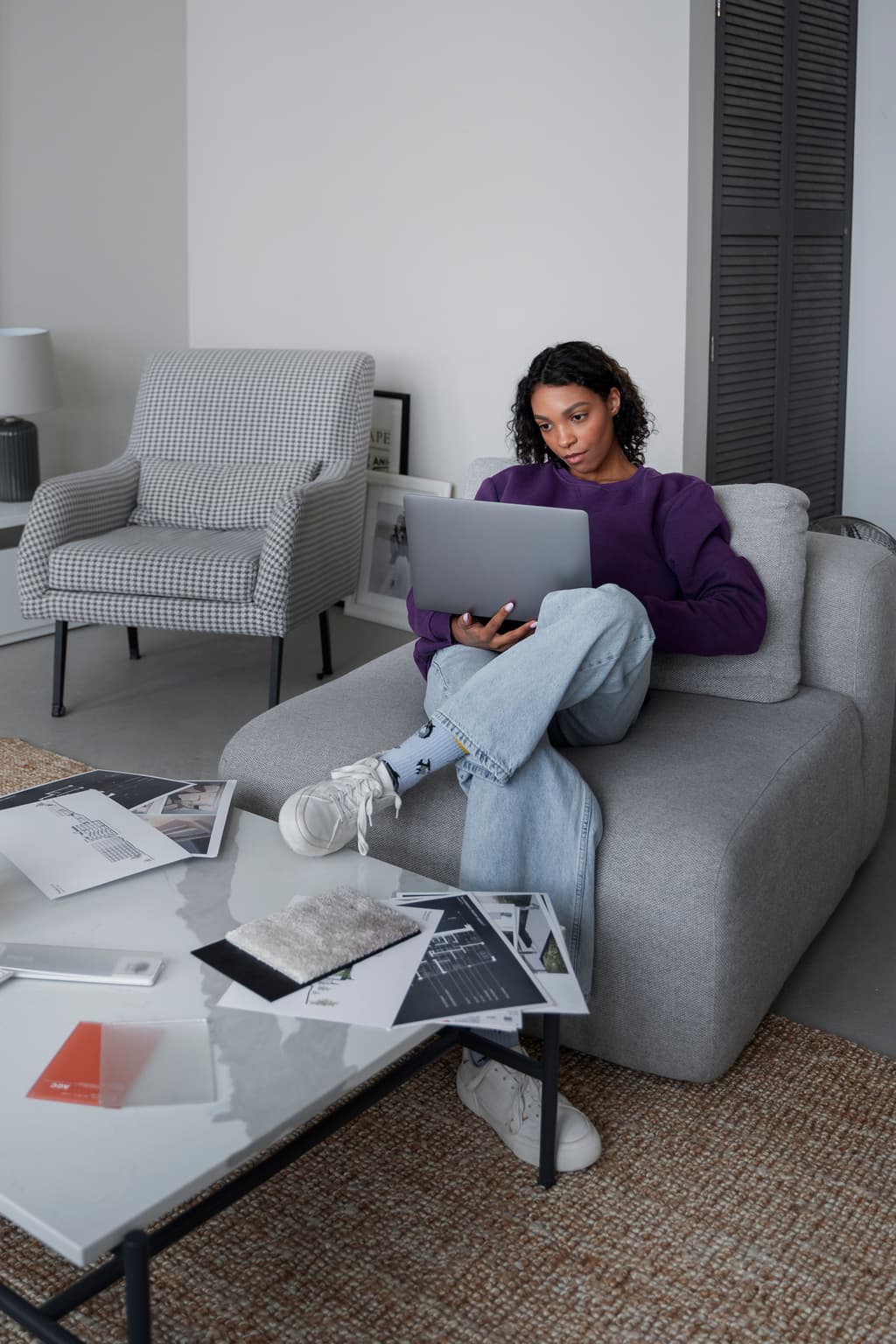 A front desk manager looking at her property management reporting