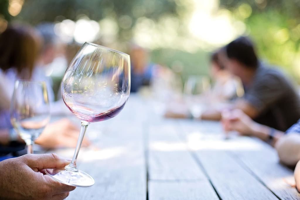 Wine tasting table with guests