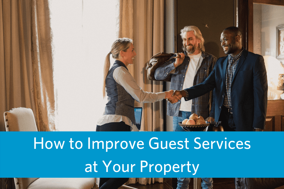 a woman greeting two male guests as they enter a hotel lobby with article title text overlay: How to Improve Guest Services at Your Property