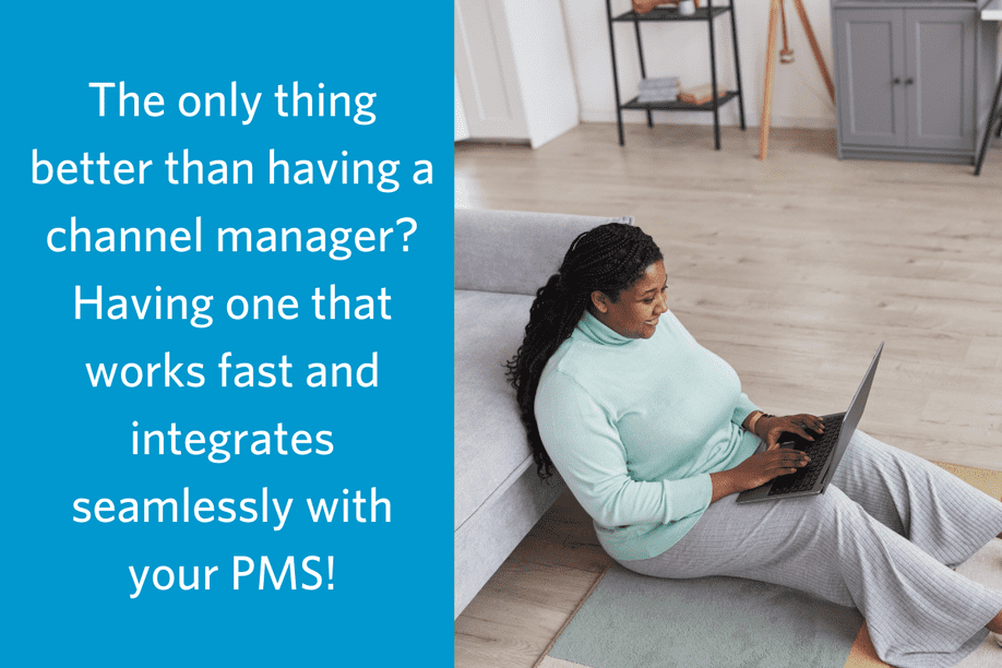 a woman sitting on the floor with her laptop smiling with text overlay that reads The only thing better than having a channel manager? Having one that works fast and integrates seamlessly with your PMS!